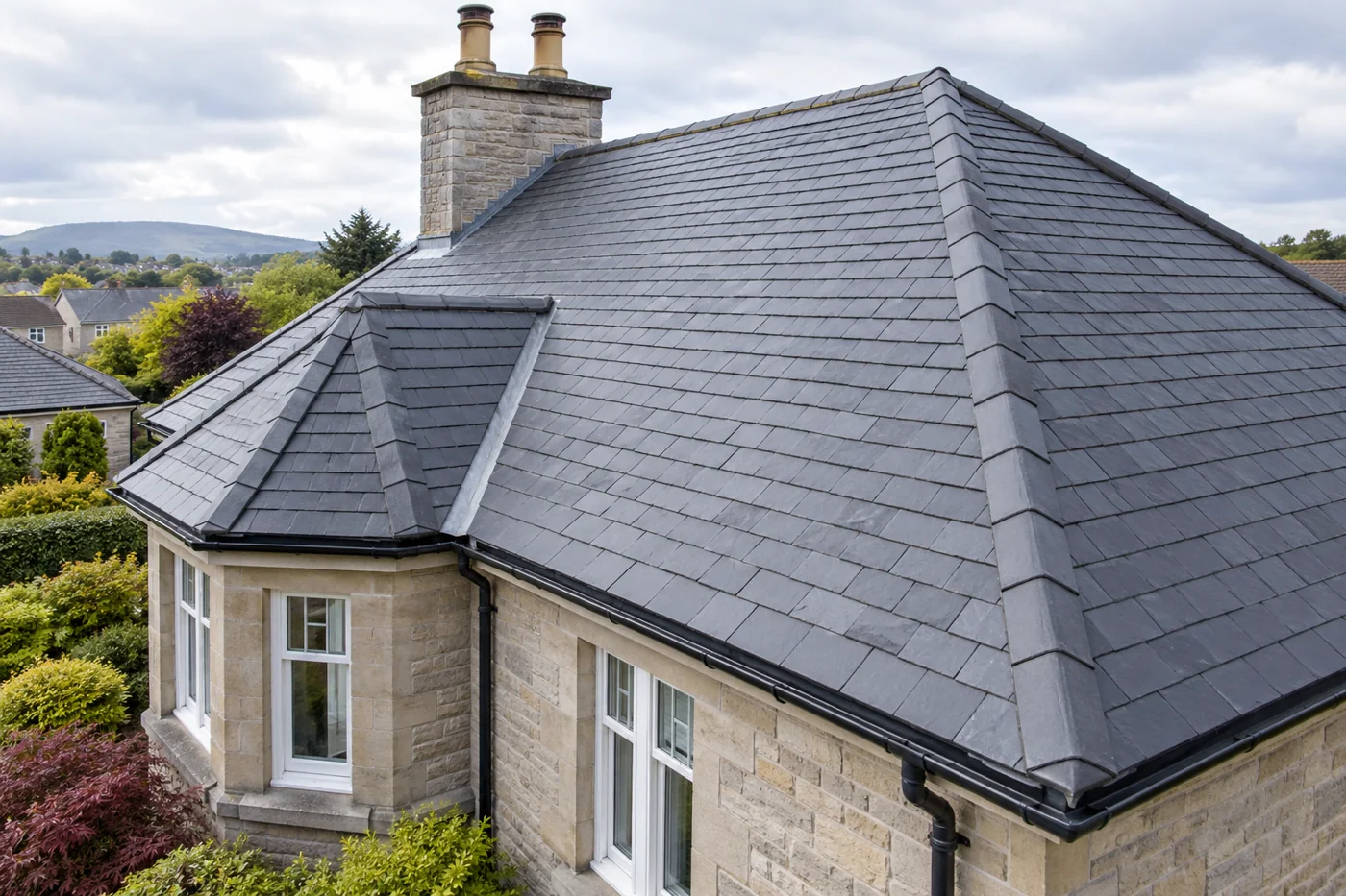Natural slate roof with a clear ridge