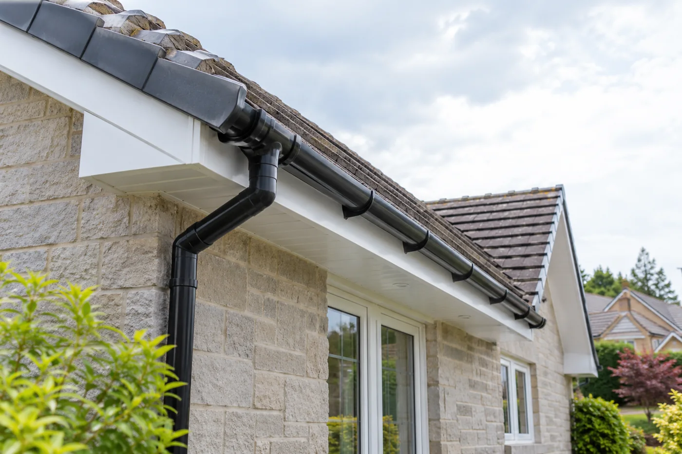 Fascia and soffit beneath tiled domestic eaves