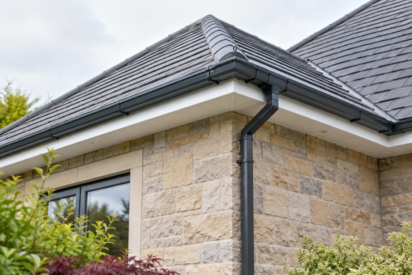 Fascia, soffit, gutter and downpipe junction